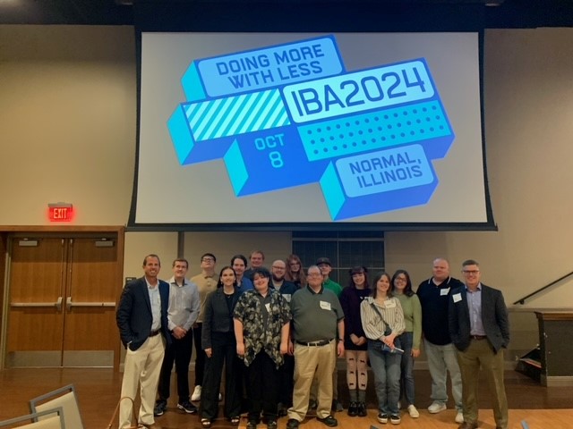 Lake Land College broadcast students and instructors standing together at an awards ceremony. 