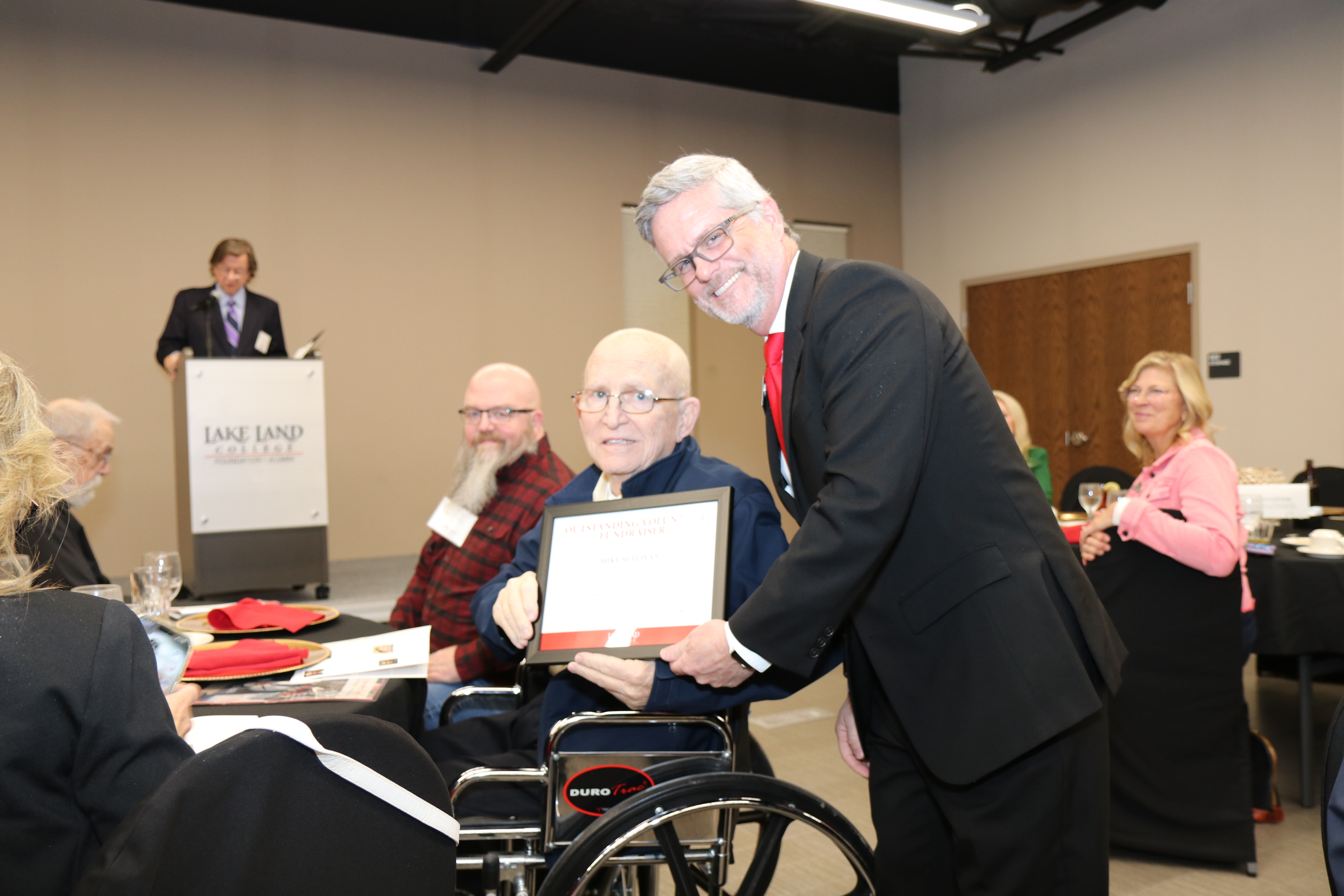 The 2024 Outstanding Volunteer Fundraiser Award Winner is recognized at a ceremony. 