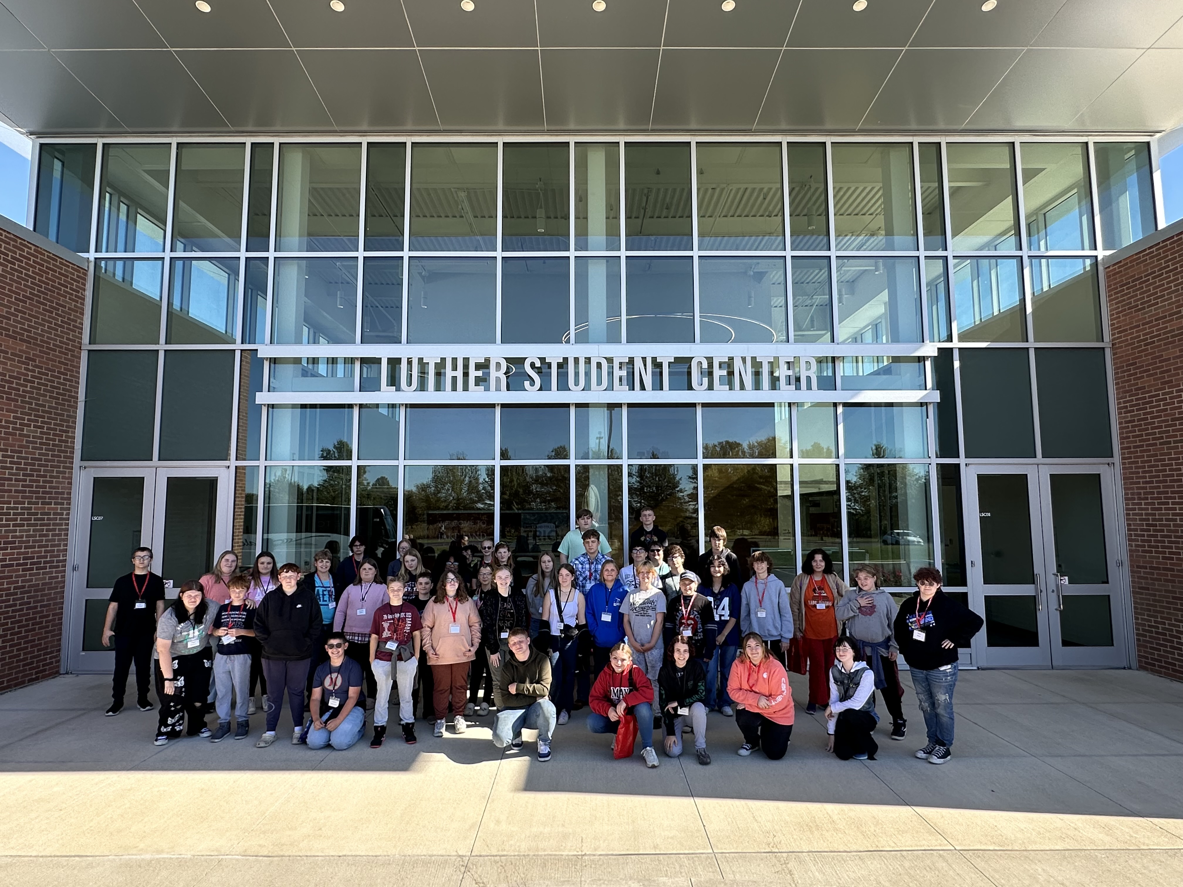 A group of junior high and high school students visiting the Lake Land College campus